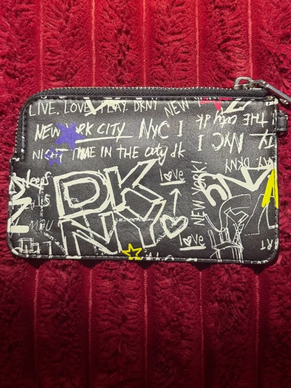 DKNY Black Graffiti Zip Card Holder with Multicolor Star Accents